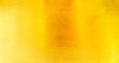 Altın metal fırçalanmış arka plan veya fırçalanmış çelik dokusu
