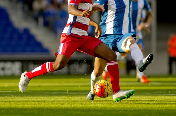 Soccer players in action — Stock Photo, Image