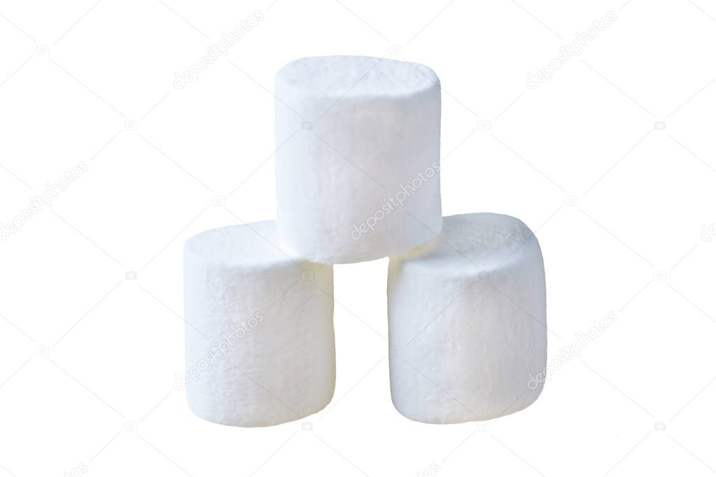 Heap of three pieces of raw sweet tasty marshmallows cylindrical form isolated on white background. Close-up