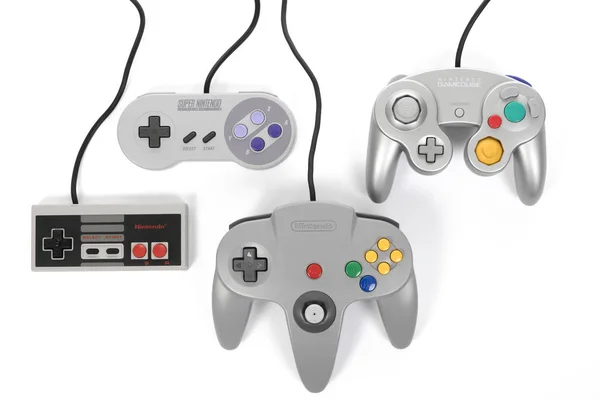 Первые четыре игровых контроллера Nintendo — стоковое фото