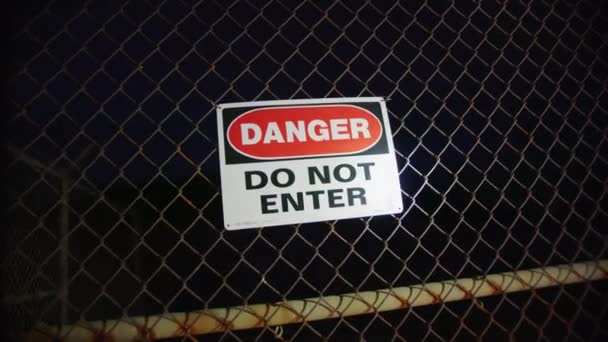 Danger Enter Sign Fence Night — Stock Video