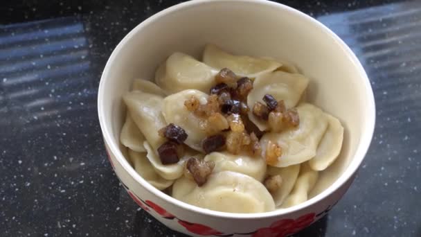 The national dish dumplings are just cooked on the gas stove — Stock Video