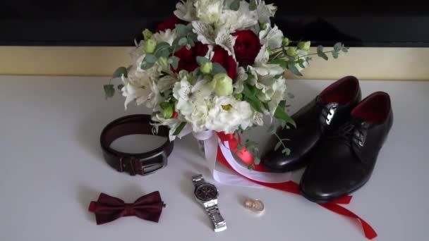 Beautiful men wedding accessories. Shoes, rings, bouquet, belt and tie. — Stock Video