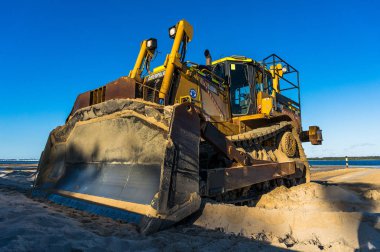 Caterpillar Dozer çok arazi yükleyici Sans Souci sahilde