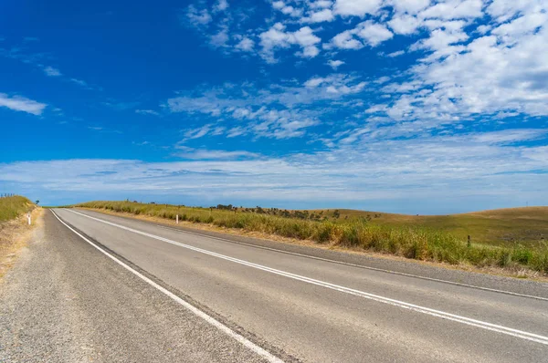 Asphalt road on sunny day — Stock Photo, Image