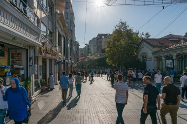 Crowd of people on famous Istiklal street in Beyoglu suburb of I