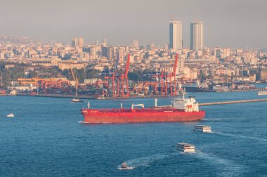 NS Parade oil chemical tanker in Bosporus with Istanbul cityscap