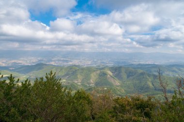 Summer landscape with green hills and valley