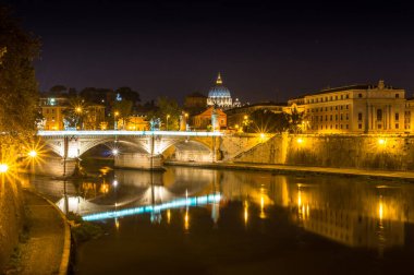 Night Rome cityscape with view of St Peters Basilica in Vatican 