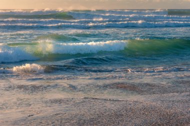 Beautiful stormy waves with water spray. Power in nature backgro