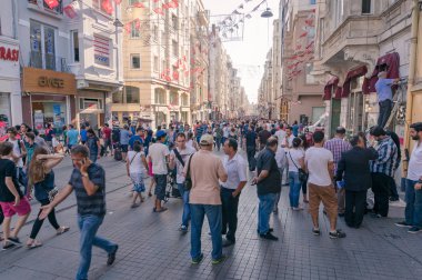 Crowd of people walking famous Istiklal street in Beyoglu suburb