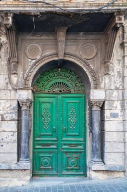 Beautiful old vintage green wooden door architectural detail