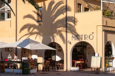 Outdoor restaurant exterior in San Vincenzo coastal town n Italy