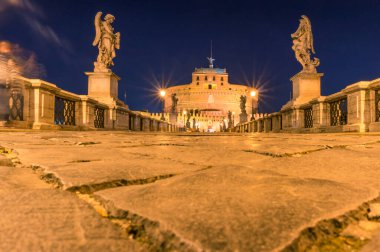 Castel Sant Angelo and bridge with statues at night