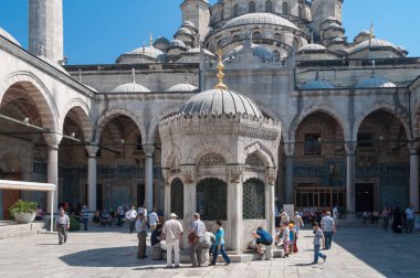 People, locals and tourists in inner courtyard of New Mosque in 