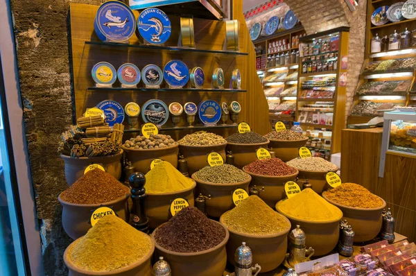 Spice shop with assortment of different spices in clay pots — 스톡 사진