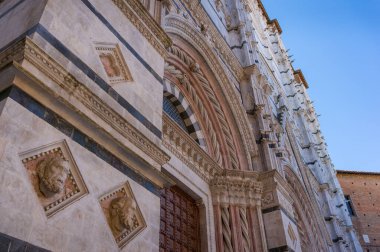 Close up of architectural details of Siena cathedral facade