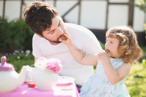 Cute little lady playing tea party with her caring father — Stock Photo, Image