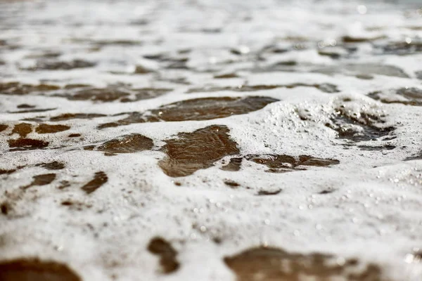 Foam on seawater. Water close-up. — Stock Photo, Image