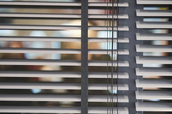 Gray plastic window blinds, close-up. — Stock Photo, Image