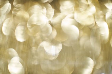 Altın bokeh. Işıkların bulanık görüntüsü. Arkaplan