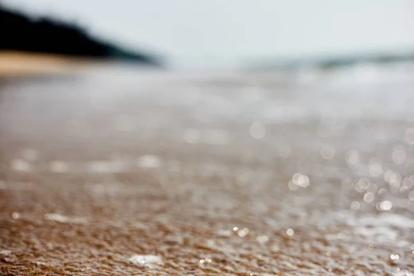 Schaum auf Meerwasser. Wasser aus nächster Nähe. — Stockfoto