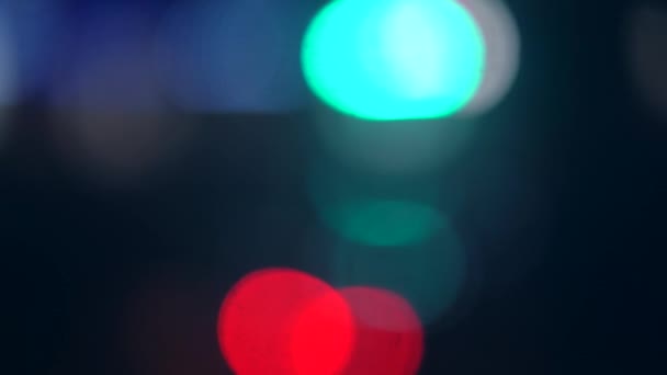Blurred night city background. Bokeh view of the city. — Stock Video
