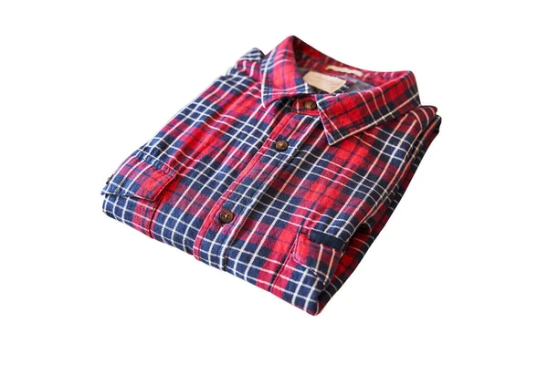 red checkered flannel shirt folded on a white isolated background