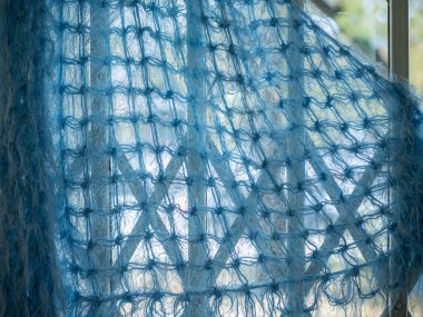 Şeffaf, yünlü, örülmüş kumaşın güzel bir manzarası..