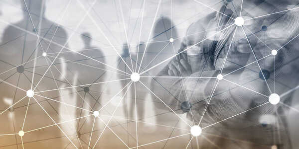 Сеть блокчейн на фоне размытых небоскребов. Концепция финансовых технологий и коммуникаций.