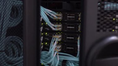 RUSSIA, MOSCOW - December 06, 2019: Gap between the server racks doors. Severs computer in a rack at the large data center.