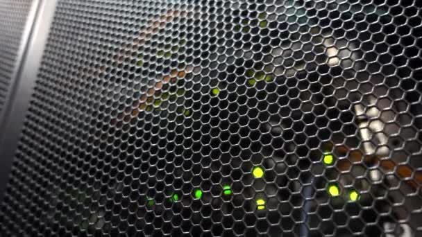 Door of a server rack close-up. Blurred Blink Background. Honeycombs — Stock Video