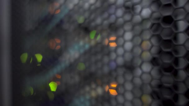 Honeycomb pattern doors inside modern big data server rack in the data center. Blurred background. — Stock Video