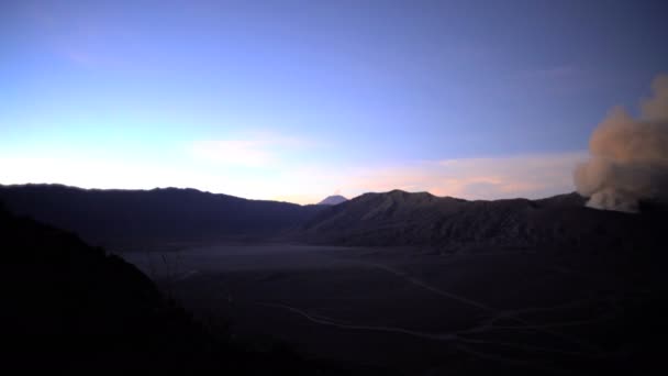 Smoke cloud erupting from a crater — Stock Video