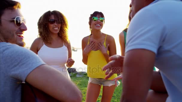 Friends enjoying party on beach — Stock Video