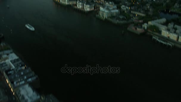 Illuminated buildings and the River Thames — Stock Video