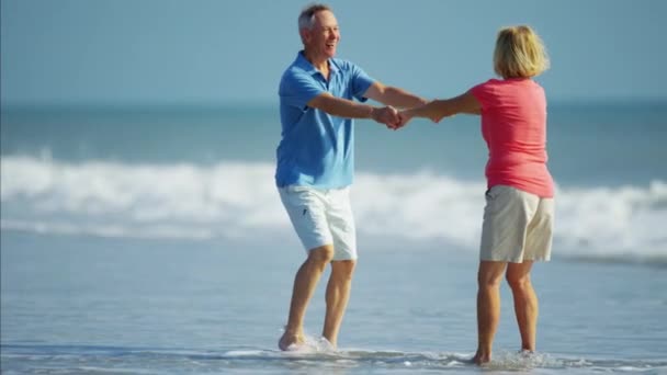 Couple having fun on beach — Stock Video