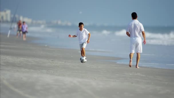 Father and son playing with soccer ball — Stock Video