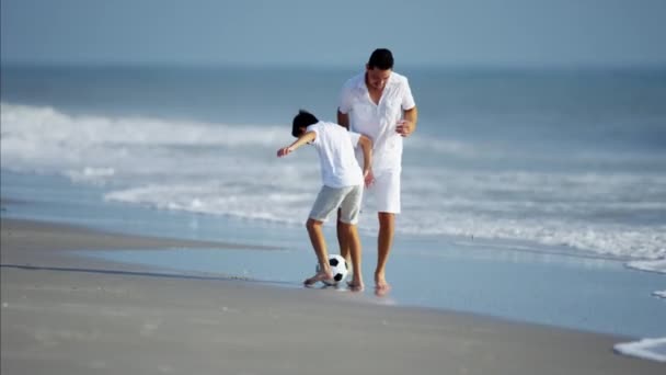 Father and son playing with soccer ball — Stock Video