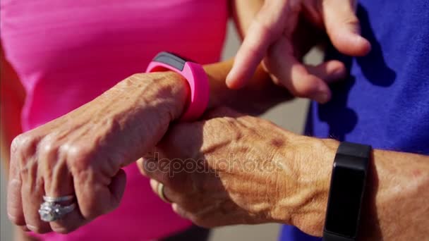 Couple wearing sport watches — Stock Video