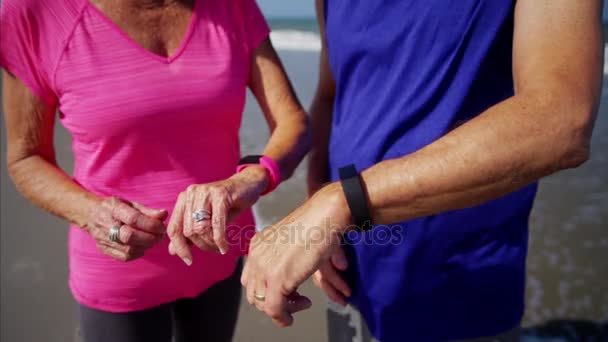 Couple wearing sport watches — Stock Video