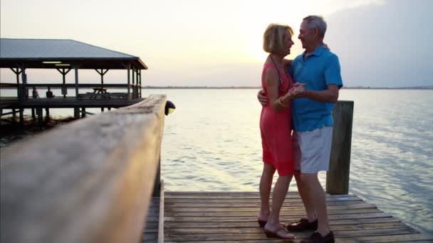 Couple dancing on the pier — Stock Video