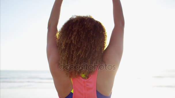 Female with dumbbells doing arm raises — Stock Video