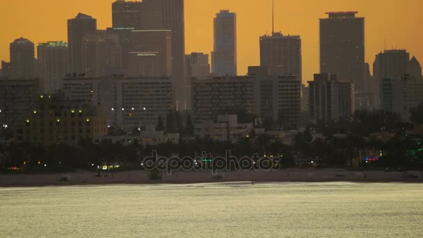 Illuminated view of Art Deco resort buildings — Stock Video