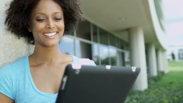 Student holding tablet — Stock Video