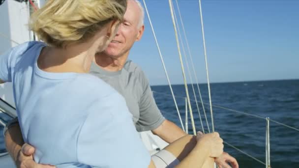 Husband and wife outdoors on their sailing boat — Stock Video