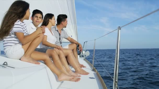 Parents with son and daughter traveling on yacht — Stock Video