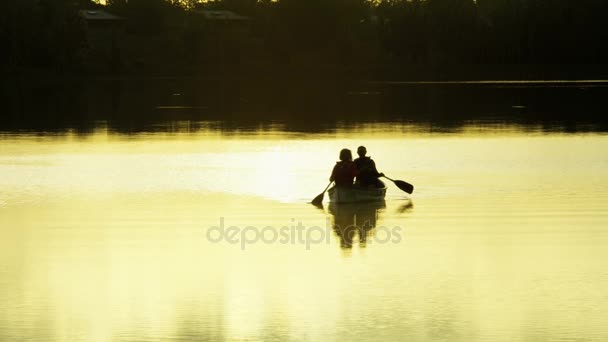 Seniors ride in the canoe — Stock Video