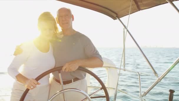 Couple on their sailing yacht — Stock Video