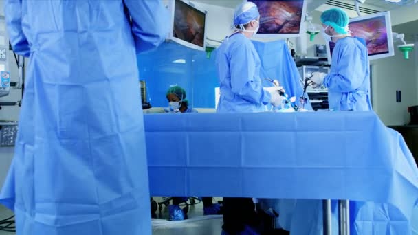 Surgeons performing Laparoscopic operation — Stock Video